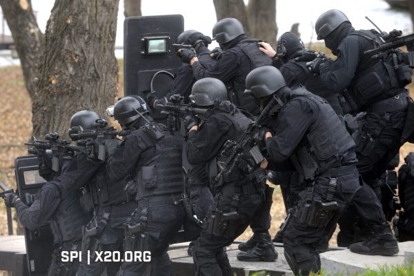 police FBI shields rifeles scopes protective gear ppe